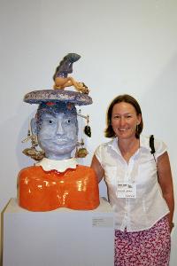 Bay Area Ceranic Sculptor Antonia (Tuppy) Lawson with her Tsunami inspired piece Tin Hau ( Godess of the Sea) part of her Kitchen God Series, shown at the CCACA exhibit at John Natsoulas Gallery