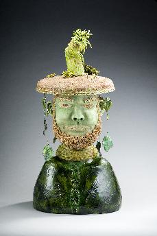 Ceramic sculpture of earth god with tree spirit on head