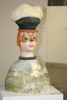 Ceramic sculpture englisg girl with lamb on her head and landscape drawing on body