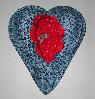 large ceramic wall art sculpture in shape of a heart ,red glazed inside with butterfly sitting on a bed of snails, cobalt blue textured star motif on the surface, opening in shape of pussy, created by english sfo bayarea artist and ceramic sculptor antonia tuppy lawson