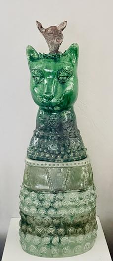 Green glazed cat sculpture with rat on head